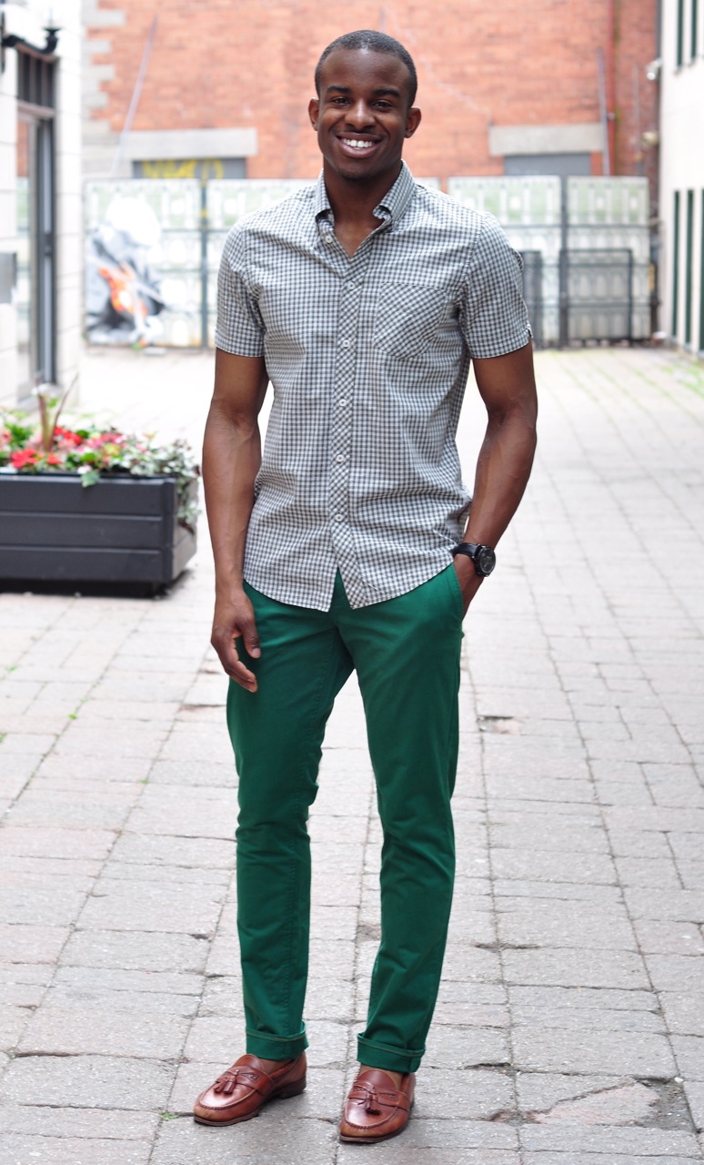 black shirt and dark green pants